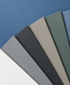 Sechs fächerförmig angeordnete Dekorplatten zeigen Uni Weiß, Uni Mittelgrau, Uni Anthrazit, Uni Taupe, Uni Olivgrün und Uni Stahlblau.